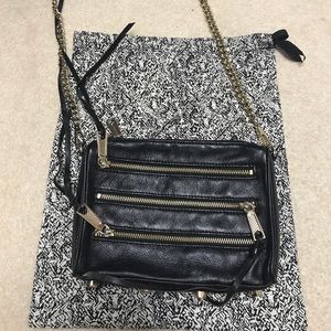Rebecca Minkoff black mini 5 zip fringe bag